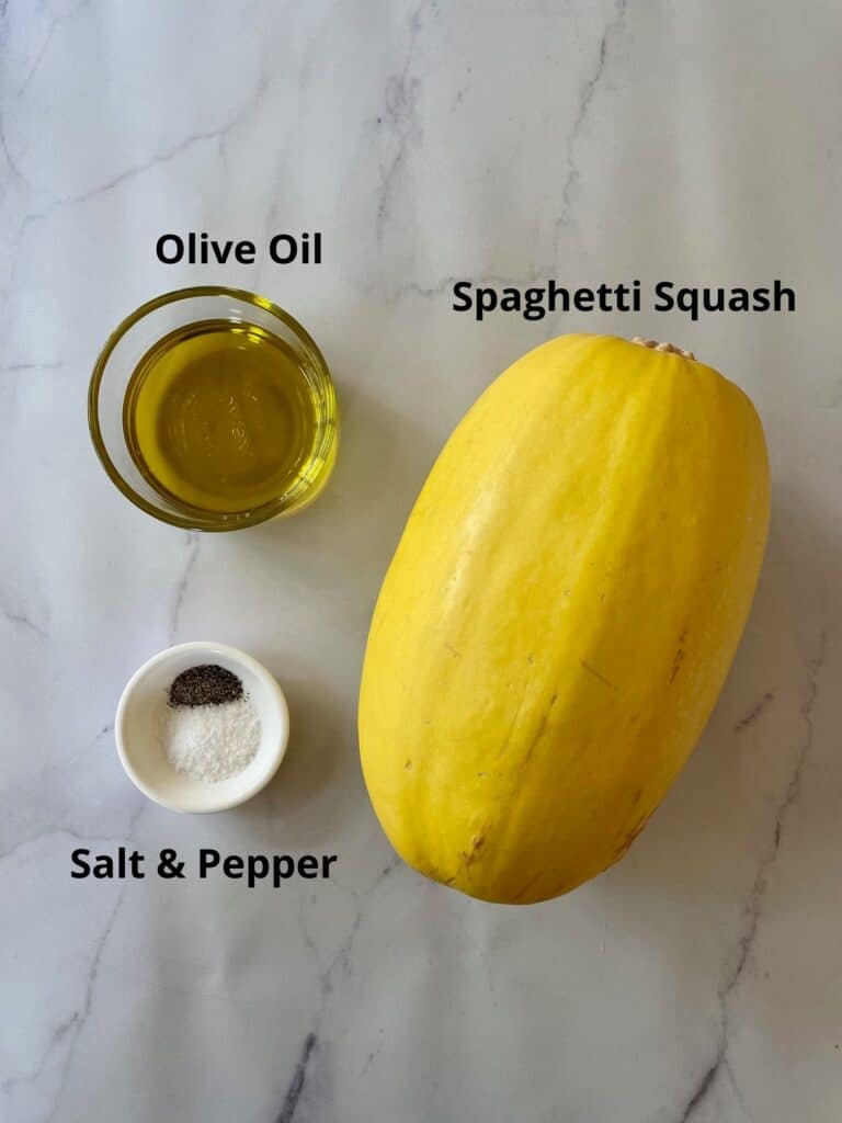Ingredients needed for the grilled spaghetti squash. Ingredients needed are fresh spaghetti squash, olive oil and salt and pepper. 