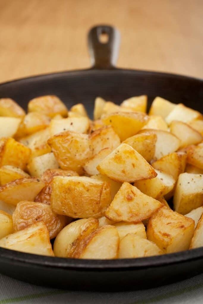 home fried potatoes in a cast iron skillet