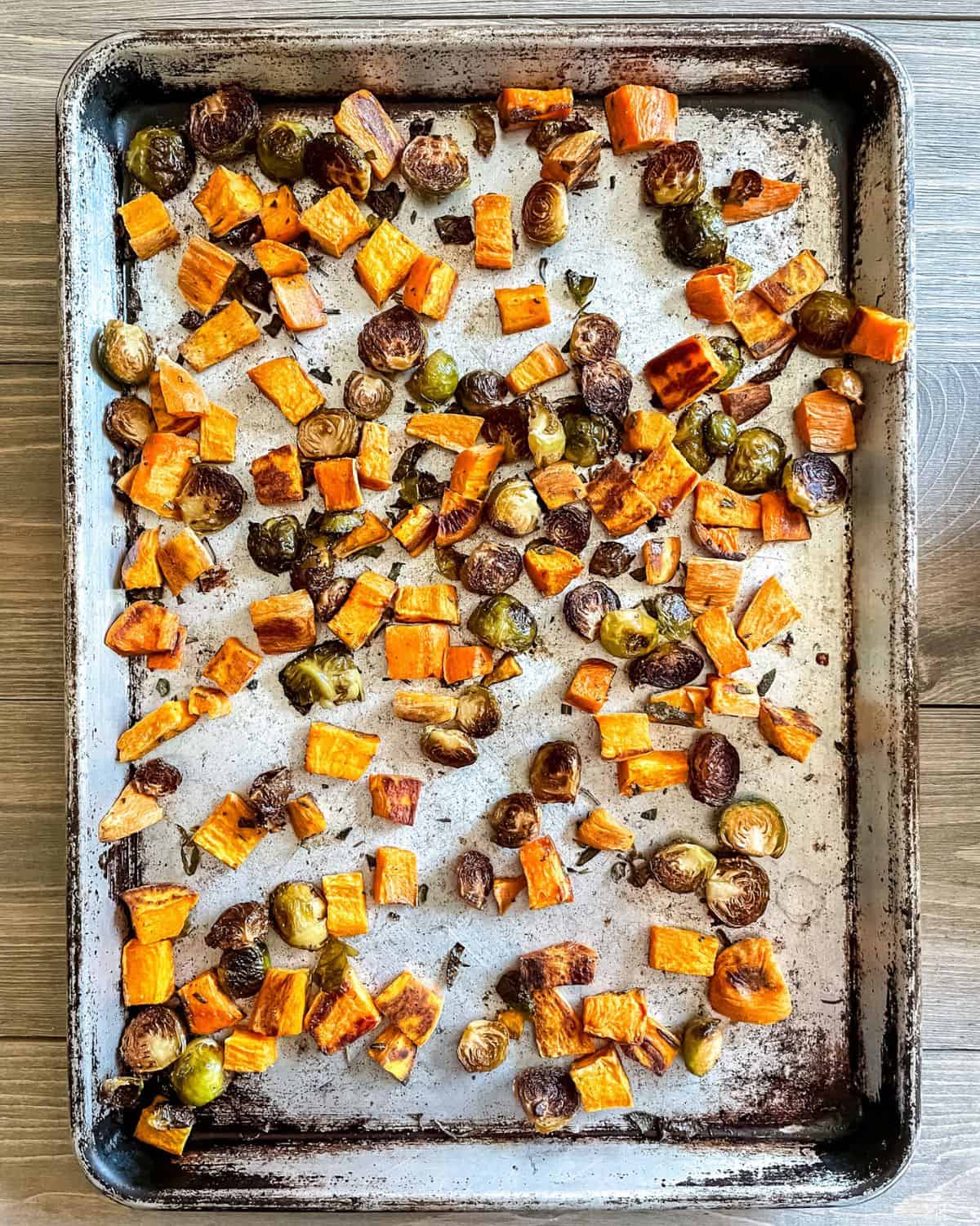 Roasted vegetables on a sheet pan.
