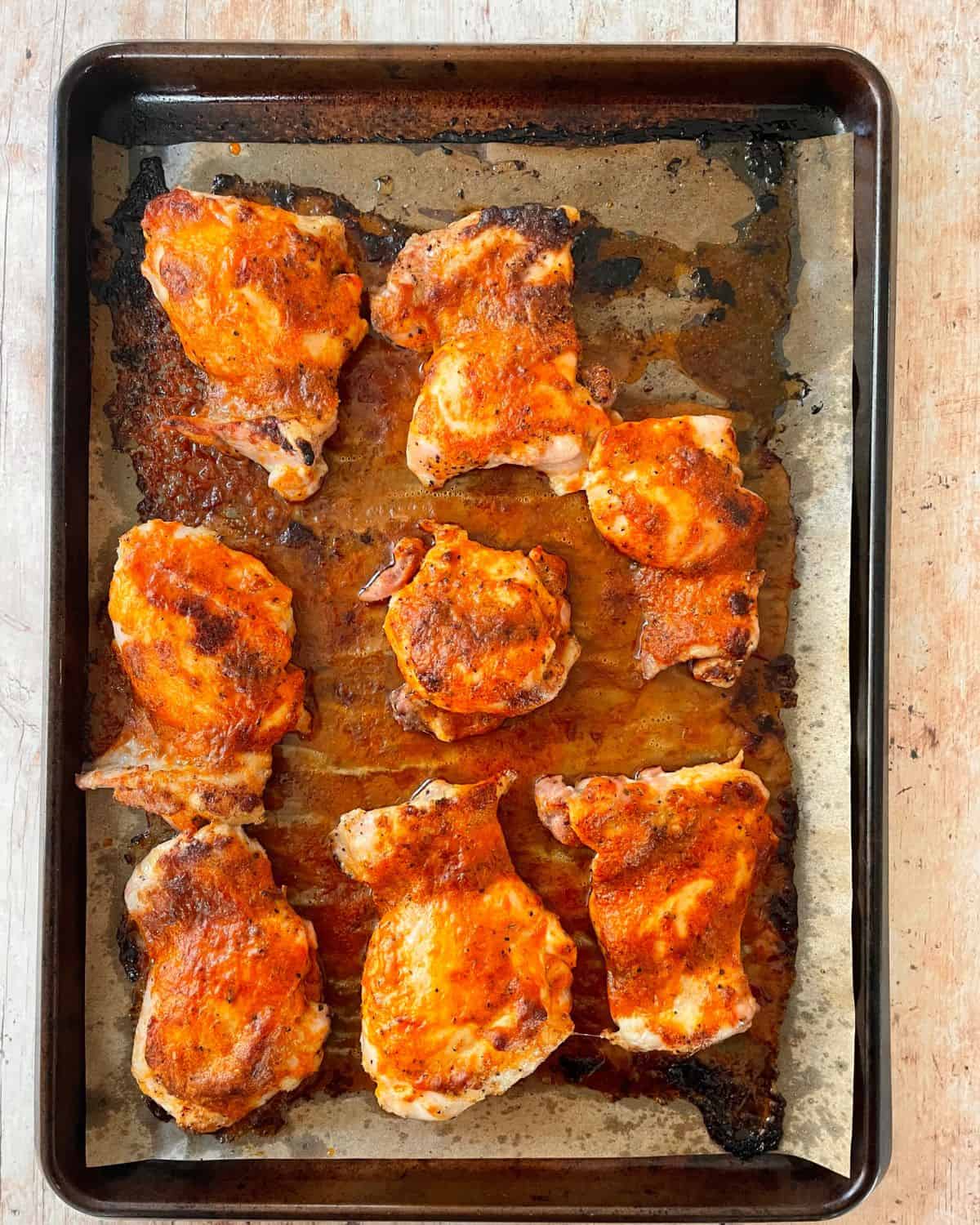 Baked and broiled Buffalo Chicken Thighs.