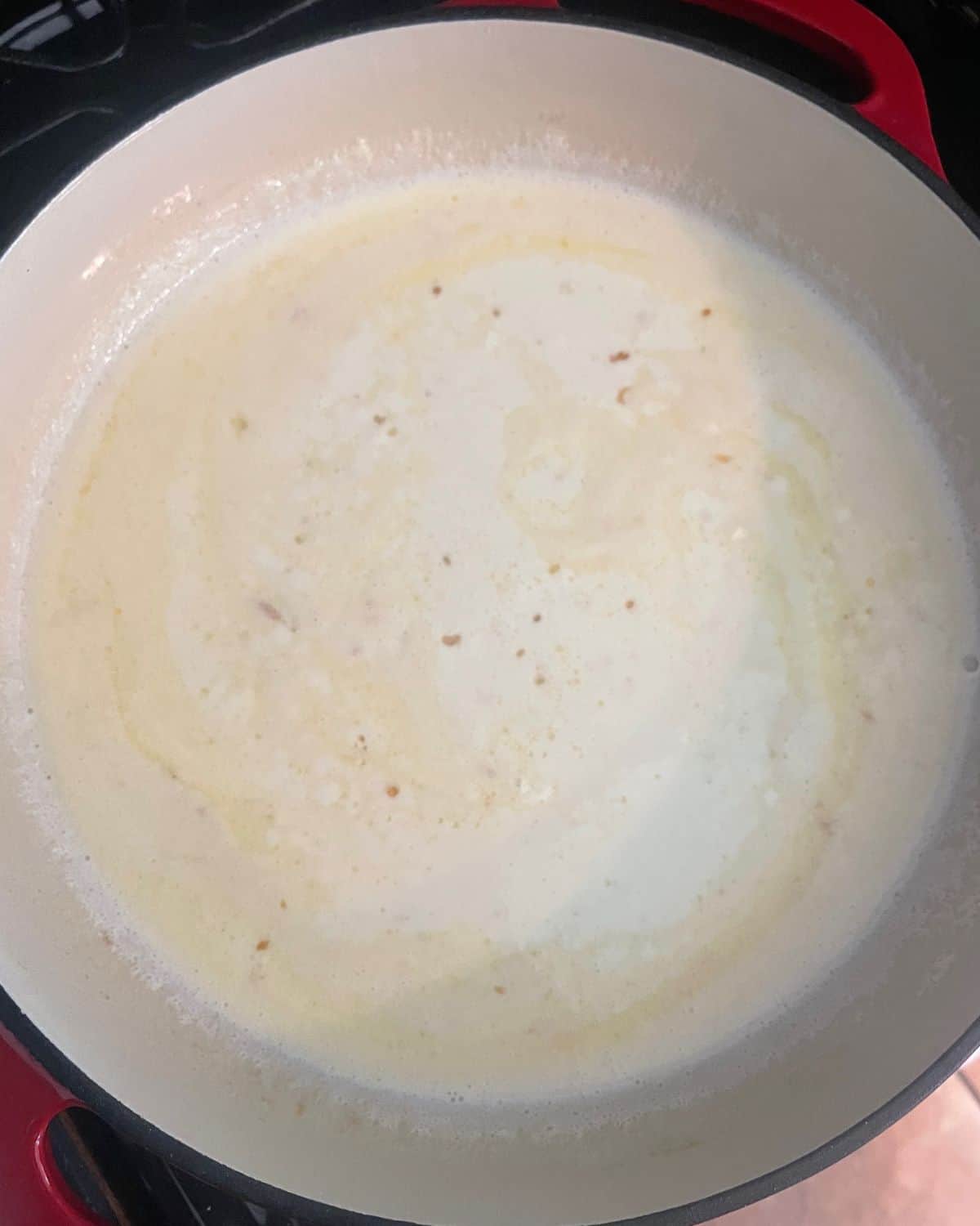 Heavy cream added to the white wine, butter, and garlic.