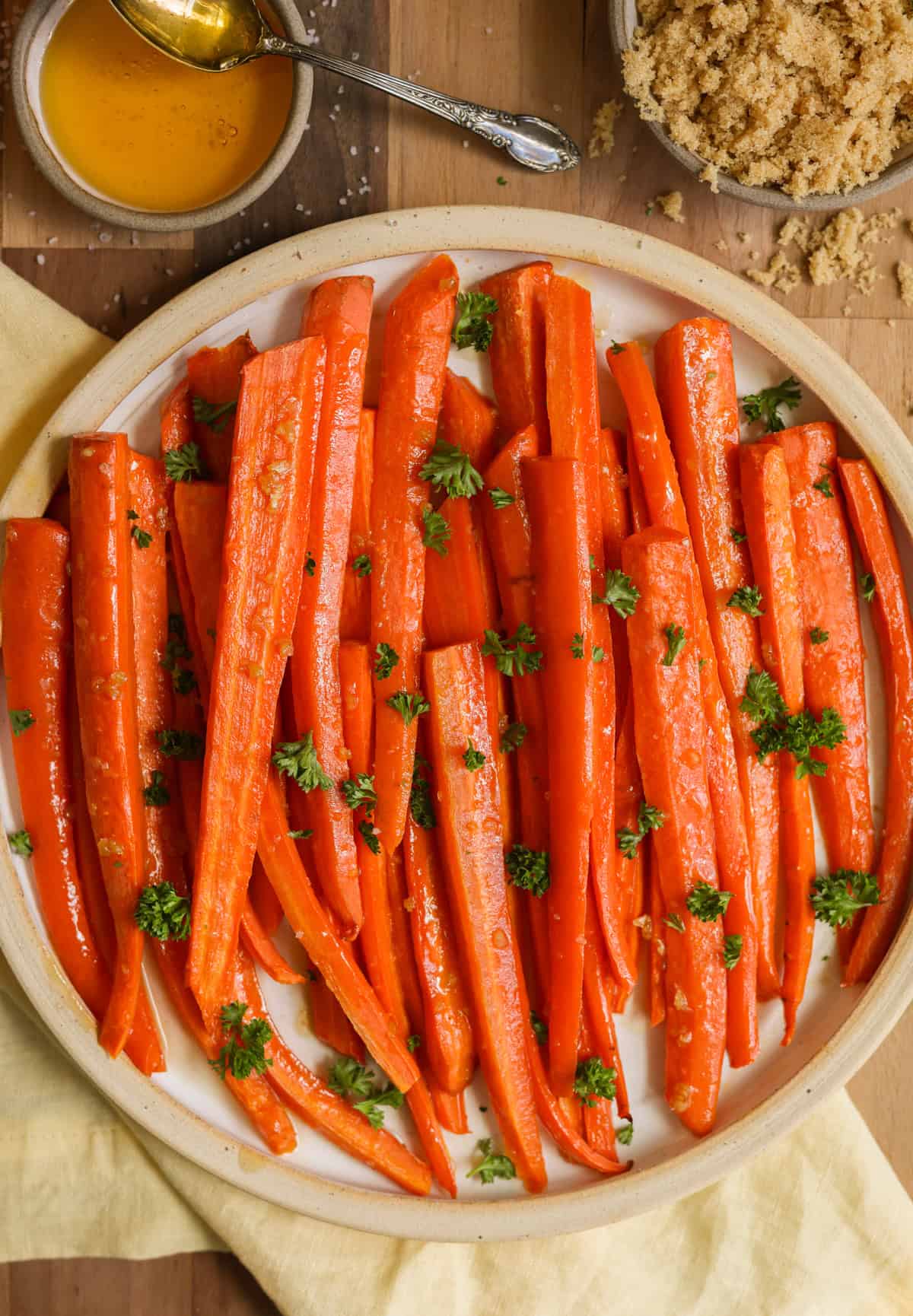 Honey and brown sugar glazed carrots on a plate.