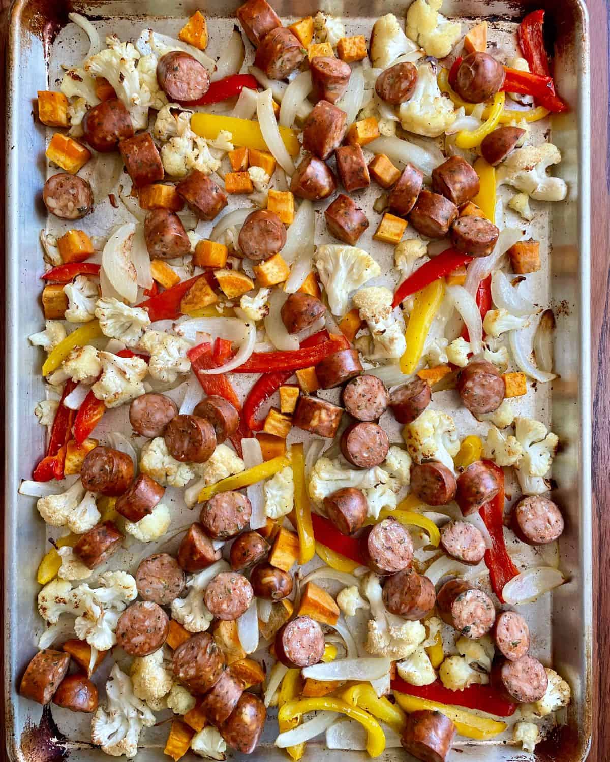 Roasted sheet pan chicken sausage and veggies.