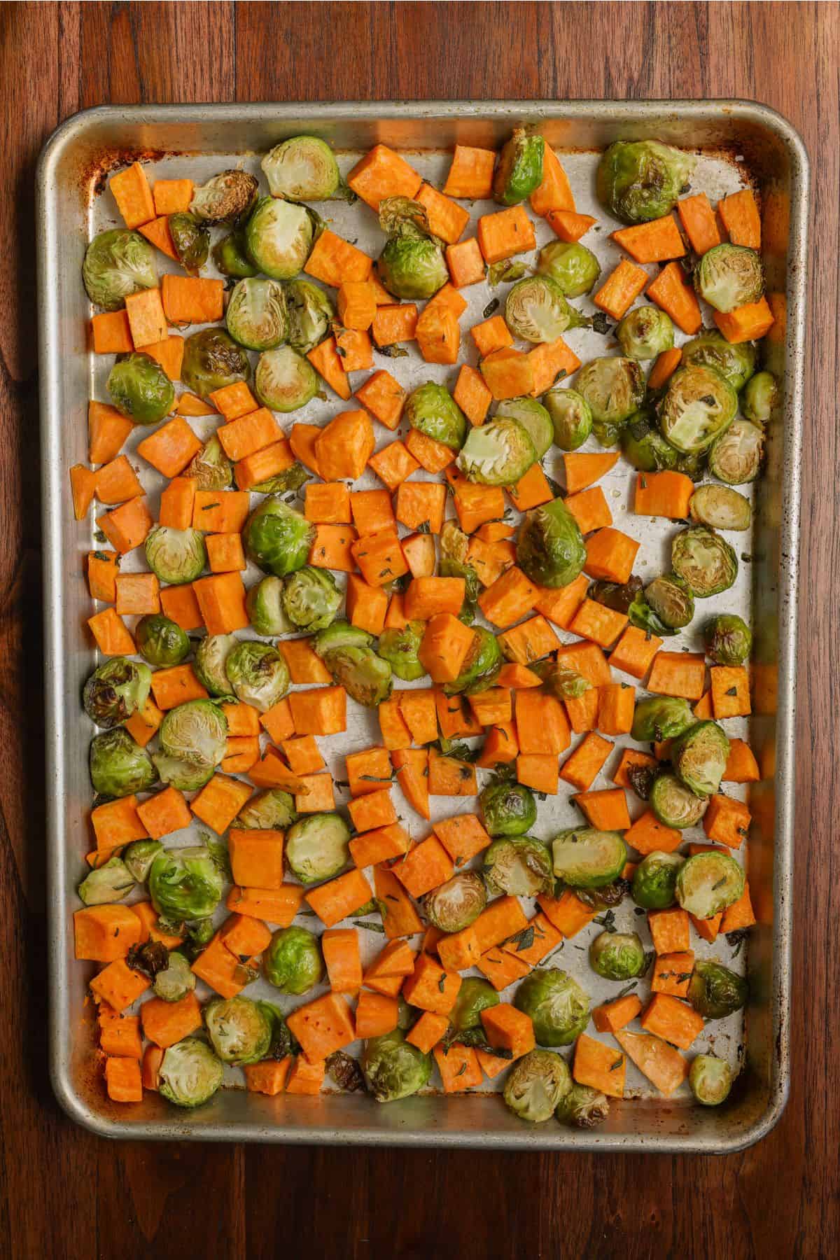 Roasted vegetables on a baking sheet.
