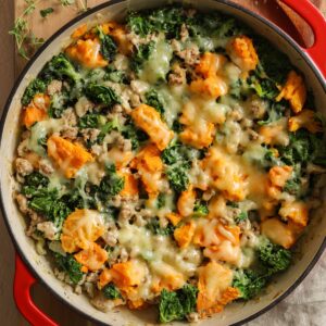 The finished dish in a large red skillet.
