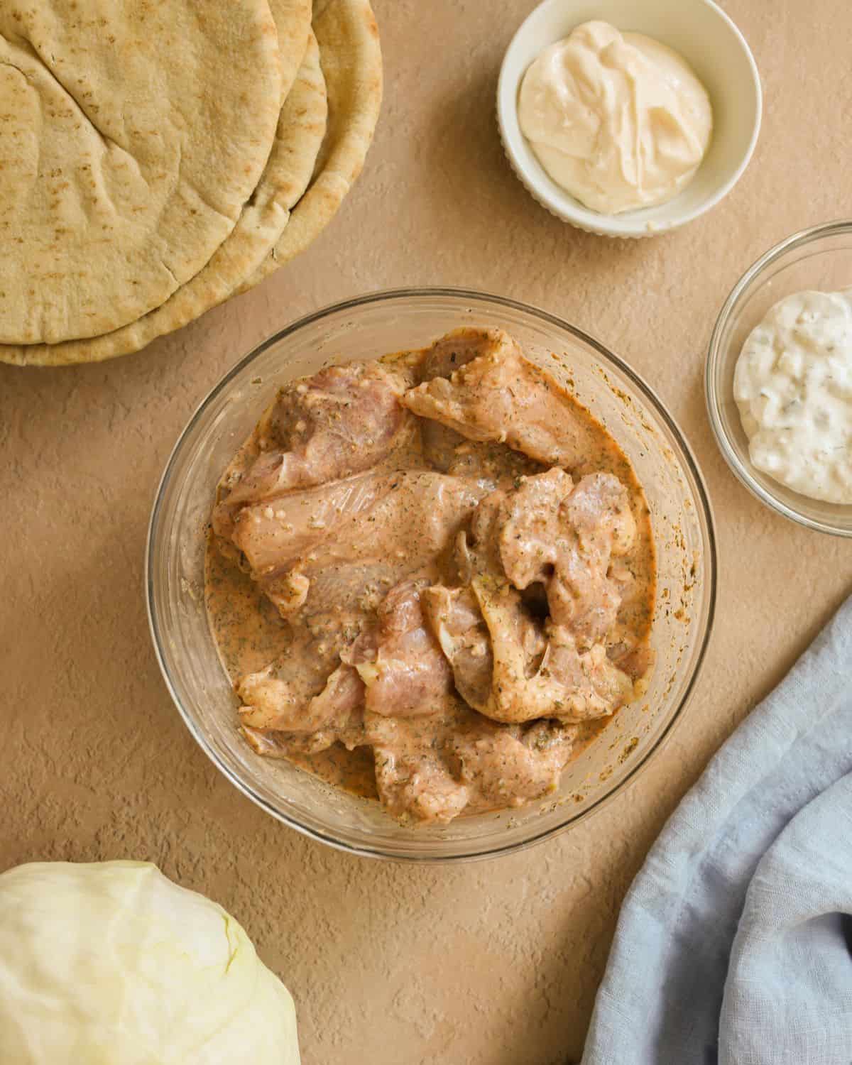 Boneless chicken thighs in a greek yogurt marinade.