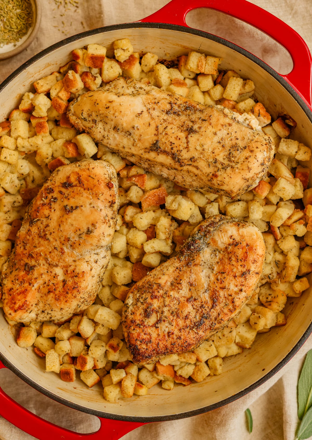 The chicken and stuffing bake in a skillet.
