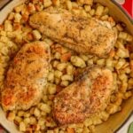 Baked chicken and stuffing in a skillet.